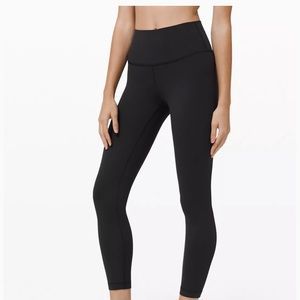 Black Lululemon leggings, slightly cropped